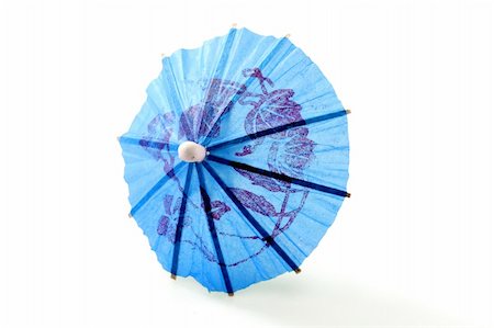 Close up of a smal paper umbrella Stock Photo - Budget Royalty-Free & Subscription, Code: 400-05024821