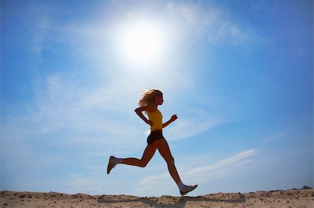 feet marathon - girl runs on sand Stock Photo - Budget Royalty-Free & Subscription, Code: 400-05025031