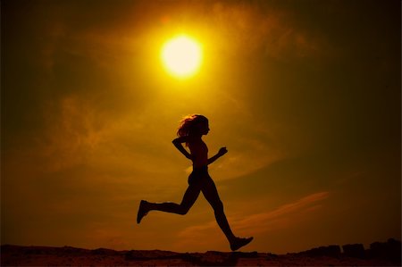 feet marathon - girl runs on sand Stock Photo - Budget Royalty-Free & Subscription, Code: 400-05025033