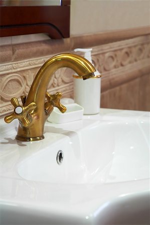 simsearch:400-04026996,k - The beautiful water faucet from bronze in a bathroom Stock Photo - Budget Royalty-Free & Subscription, Code: 400-05025753