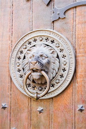 Lion door knocker on a church in Oslo, Norway Stock Photo - Budget Royalty-Free & Subscription, Code: 400-05026680