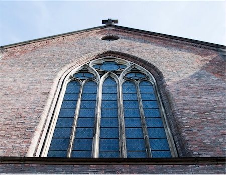 A large window on a brick church building Stock Photo - Budget Royalty-Free & Subscription, Code: 400-05026681