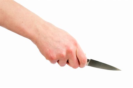 A small pearing knife in a female hand, ready to cut something.  Isolated on white with clipping path. Stock Photo - Budget Royalty-Free & Subscription, Code: 400-05026758