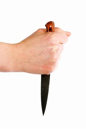 A small pearing knife in the hand of a woman.  The knife is held in a dagger grip. Isolated on white with clipping path. Stock Photo - Budget Royalty-Free & Subscription, Code: 400-05026761
