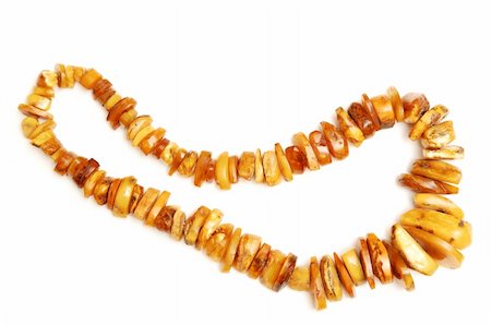 An heavy amber necklace of natural amber stones in different dices. Photographie de stock - Aubaine LD & Abonnement, Code: 400-05027085