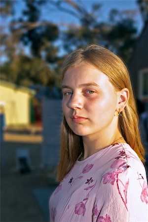 a stern young woman looks at the camera Stock Photo - Budget Royalty-Free & Subscription, Code: 400-05027715