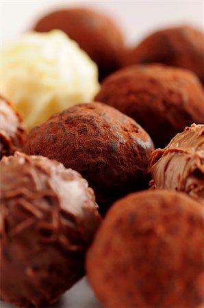 Several assorted gourmet chocolate truffles close up Stock Photo - Budget Royalty-Free & Subscription, Code: 400-05028053