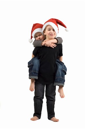 simsearch:400-07088886,k - Two adorable brothers with Christmas hats. On white background. Stock Photo - Budget Royalty-Free & Subscription, Code: 400-05028407