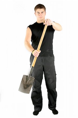 man in black ready to work using shovel Stock Photo - Budget Royalty-Free & Subscription, Code: 400-05028673