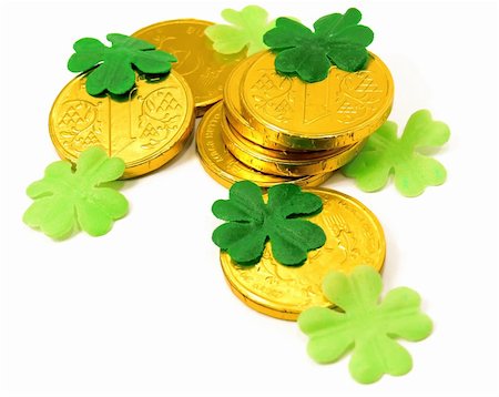 simsearch:841-06449472,k - Saint Patrick's Gold and green clover leaves on white background Foto de stock - Super Valor sin royalties y Suscripción, Código: 400-05029035