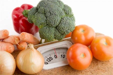 simsearch:400-03986813,k - Garden vegetables on a bathroom scale Stock Photo - Budget Royalty-Free & Subscription, Code: 400-05029046