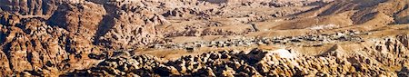 Panoramic landscape of arabic village in  Petra - Nabataeans capital city (Al Khazneh) in Jordan. Banner format. Early morning. Stock Photo - Budget Royalty-Free & Subscription, Code: 400-05029157