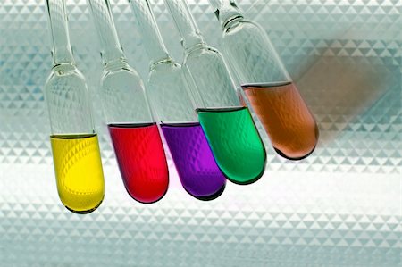 shape of chemistry lab equipment - five flask with different-coloured chemical liquids Stock Photo - Budget Royalty-Free & Subscription, Code: 400-05029242