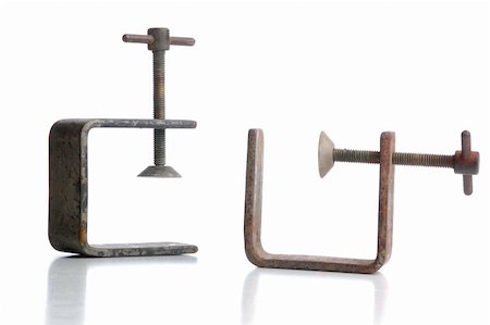simsearch:400-08290594,k - two old rusty vises with their reflections, isolated on white Photographie de stock - Aubaine LD & Abonnement, Code: 400-05029262