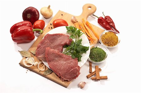 foodstuff: meat and vegetables on the wood board Stock Photo - Budget Royalty-Free & Subscription, Code: 400-05029384