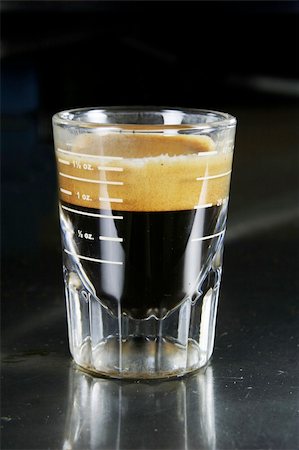 Single espresso in a shot glass with full crema Stock Photo - Budget Royalty-Free & Subscription, Code: 400-05029728