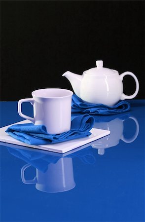A modern home decor shot of a table set for tea Stock Photo - Budget Royalty-Free & Subscription, Code: 400-05029939