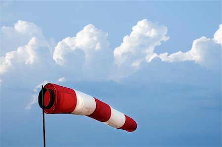 simsearch:400-07933124,k - Windsock close-up against the blue sky with clouds Stock Photo - Budget Royalty-Free & Subscription, Code: 400-05020023