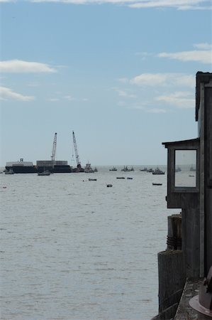 A view of many boats fishing in the Naknek river of Bristol Bay during the red salmon season. Stock Photo - Budget Royalty-Free & Subscription, Code: 400-05020082