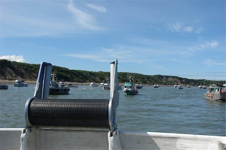 simsearch:400-05020102,k - A view of many boats fishing in the Naknek river of Bristol Bay during the red salmon season. Foto de stock - Royalty-Free Super Valor e Assinatura, Número: 400-05020105