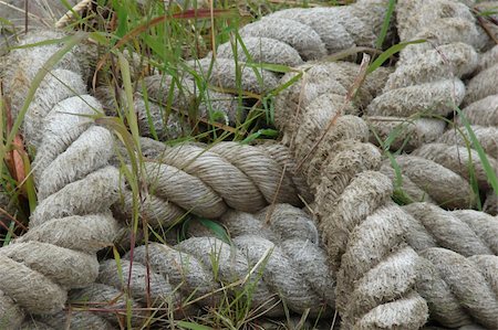 old tires, rope, shipping containers and the docks themselves - close-ups of things around the dock Photographie de stock - Aubaine LD & Abonnement, Code: 400-05020109