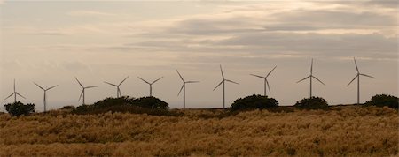 Line of wind power generators on the sky background Fotografie stock - Microstock e Abbonamento, Codice: 400-05020195