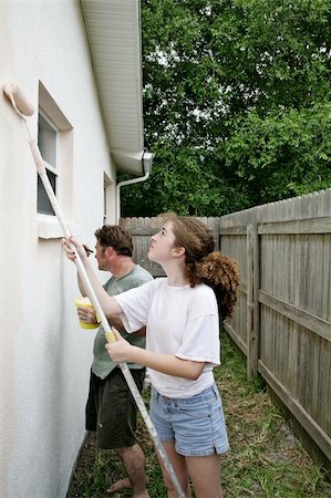 simsearch:400-04349276,k - A father and daughter painting the house togehter.  Vertical view. Stock Photo - Budget Royalty-Free & Subscription, Code: 400-05021232