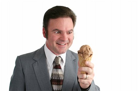excited ice cream - A businessman looking at an ice cream cone with a crazed look. Stock Photo - Budget Royalty-Free & Subscription, Code: 400-05021838