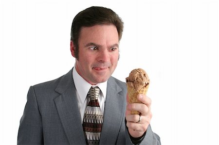 excited ice cream - A businessman drooling and looking at a chocolate ice cream cone. Stock Photo - Budget Royalty-Free & Subscription, Code: 400-05021839