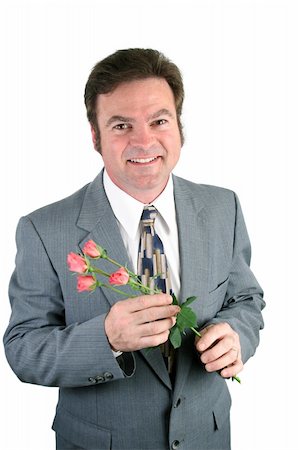 simsearch:400-04486211,k - A loving husband holding roses for his sweet-heart. Stockbilder - Microstock & Abonnement, Bildnummer: 400-05021897