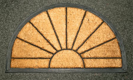 door mat welcome - Doormat made from natural material in sun shape Stock Photo - Budget Royalty-Free & Subscription, Code: 400-05021929