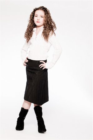 fun preteen models - Studio portrait of a young girl in a fashion pose Stock Photo - Budget Royalty-Free & Subscription, Code: 400-05022071