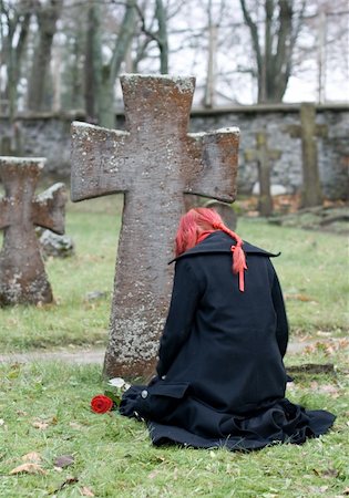 Gothic girl with a rose on a cemetery Stock Photo - Budget Royalty-Free & Subscription, Code: 400-05022094