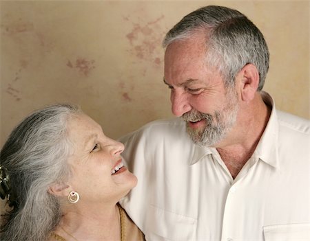 simsearch:400-03972903,k - A mature couple laughing together.  Focus on her. Stock Photo - Budget Royalty-Free & Subscription, Code: 400-05022163