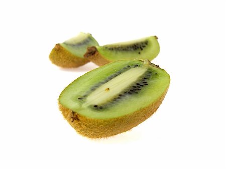 simsearch:400-04553701,k - A sliced kiwi fruit, isolated on white Stock Photo - Budget Royalty-Free & Subscription, Code: 400-05022627