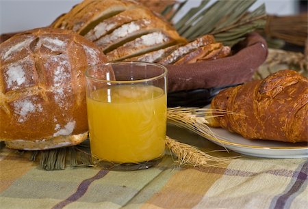 simsearch:400-03932840,k - Rustic various baked bread with orange juice Stock Photo - Budget Royalty-Free & Subscription, Code: 400-05023074