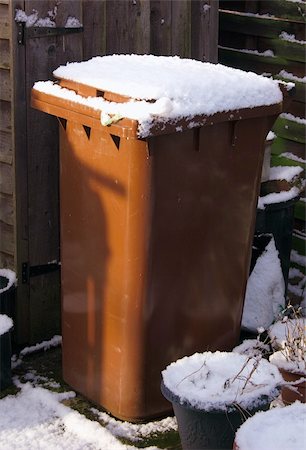 street cleaning - brown wheely bin covered with snow Stock Photo - Budget Royalty-Free & Subscription, Code: 400-05023237