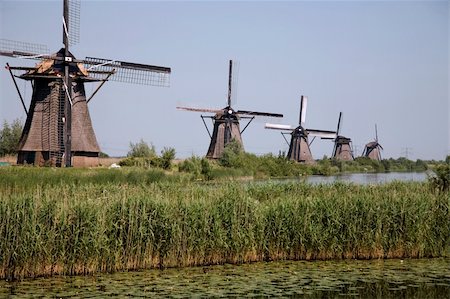Dutch windmills in Kinderdijk, Holland Photographie de stock - Aubaine LD & Abonnement, Code: 400-05023546