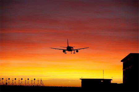Plane Landing at Sunset in Orly Airport -France Stock Photo - Budget Royalty-Free & Subscription, Code: 400-05034426
