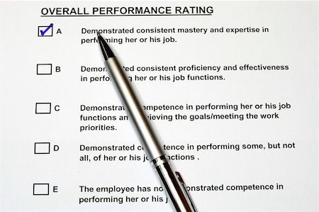 simsearch:400-05034438,k - Overall Performance Rating Form with pen checked A Stock Photo - Budget Royalty-Free & Subscription, Code: 400-05034435