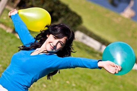 simsearch:400-03996855,k - Beautiful teen handling balloons Stock Photo - Budget Royalty-Free & Subscription, Code: 400-05034691