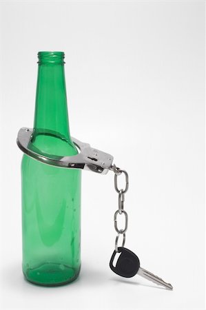 pulled over - Drunk Driving Concept - Beer, Keys and Handcuffs Stock Photo - Budget Royalty-Free & Subscription, Code: 400-05034769