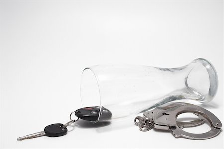 Drunk Driving Concept - Beer, Keys and Handcuffs Stock Photo - Budget Royalty-Free & Subscription, Code: 400-05034770