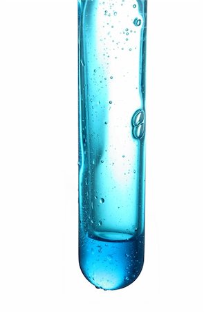 Test tube with a dark blue liquid on a white background Stock Photo - Budget Royalty-Free & Subscription, Code: 400-05034959