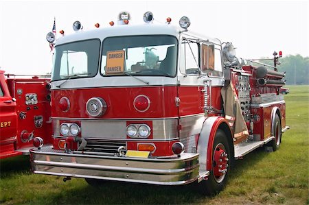 pumper - This is a picture of an old red fire engine taken at a classic truck show. Stock Photo - Budget Royalty-Free & Subscription, Code: 400-05035270