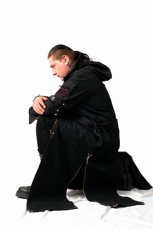alone large man in black coat, white background Stock Photo - Budget Royalty-Free & Subscription, Code: 400-05035334