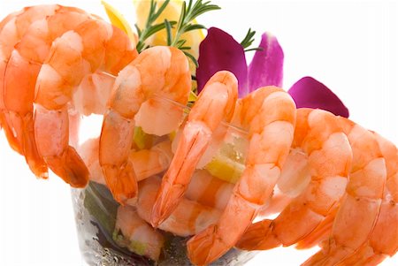 Gourmet large shrimp cocktail with beautiful exotic orchids Fotografie stock - Microstock e Abbonamento, Codice: 400-05035743