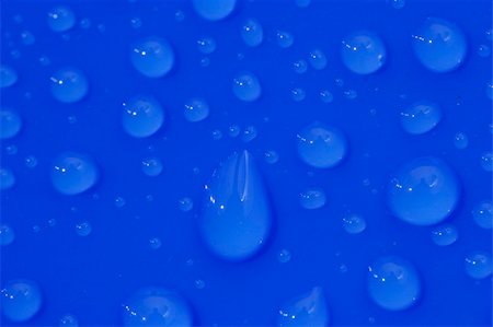 simsearch:400-03966401,k - Macro image of blue water drops Stock Photo - Budget Royalty-Free & Subscription, Code: 400-05035757