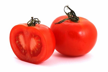Tomato and half of tomato on a white background Stock Photo - Budget Royalty-Free & Subscription, Code: 400-05035802