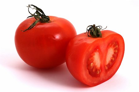Tomato and half of tomato on a white background Stock Photo - Budget Royalty-Free & Subscription, Code: 400-05035803
